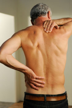 A man with mid-back and rib pain